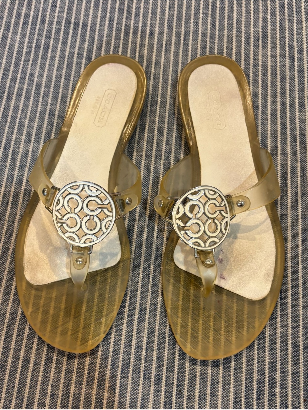 Coach Gold-Tone Clear Jelly Thong Sandals with Silver Logo